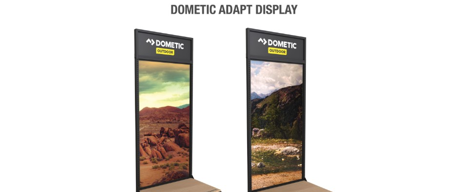 Two Dometic Adapt display stands with landscape graphics and branded headers