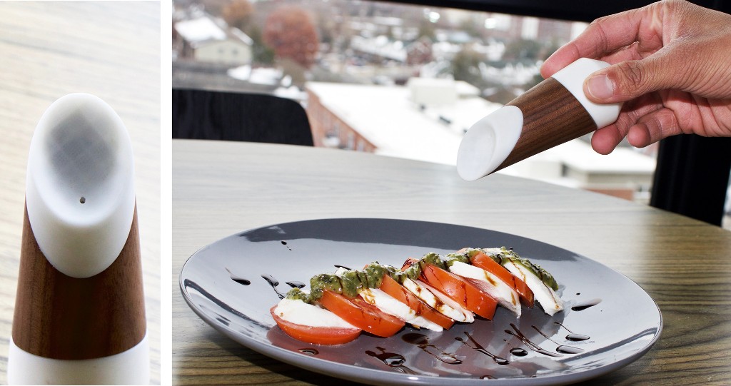 Salina shaker in use over a caprese salad with close-up of dispensing hole